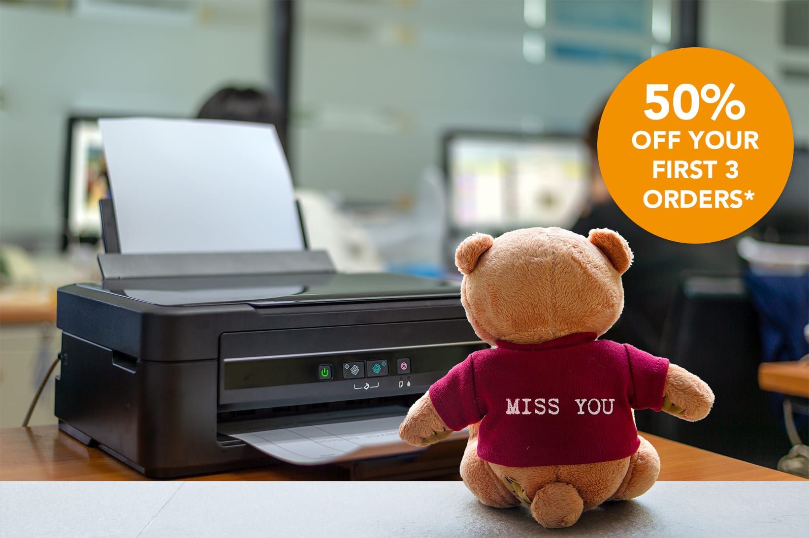 black printer in office with soft-focus and over light in the ba